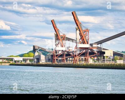 ROUEN, FRANCE - JUNE Circa, 2019. view from the Seine river to the huge buildings silos for storing and drying grain. The most important exporting com Stock Photo