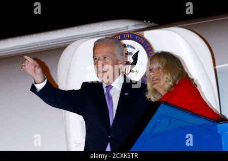 U.S. Vice President Joe Biden, accompanied by his wife Jill Biden, reacts upon his arrival at Ataturk International airport in Istanbul November 21, 2014. REUTERS/Murad Sezer (TURKEY - Tags: POLITICS)