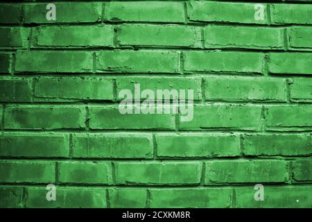 Abstract green scratched wall surface. Beautiful brick wall texture Stock Photo