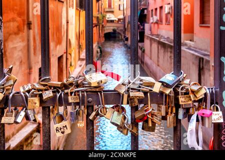 Love locks on the gate of the Canale delle Moline in Via Oberdan,  Bologna, Italy Stock Photo