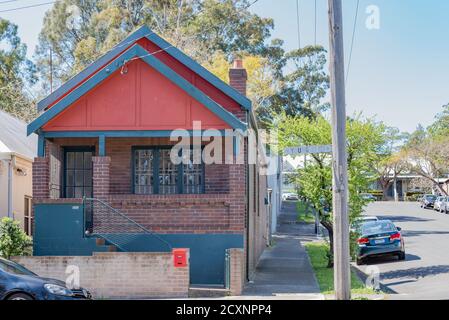 A simple small stand-alone Californian Bungalow cottage on a corner in the Sydney suburb of Annandale, New South Wales, Australia Stock Photo