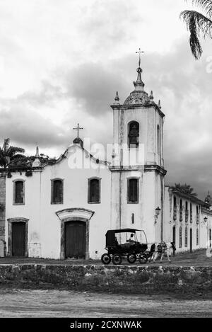 Black and white photo of exterior facade of old catholic church in historical brazilian town Stock Photo
