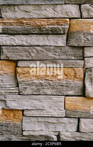 Facing stone Tanvald. Wall of decorative-facing stone Stock Photo