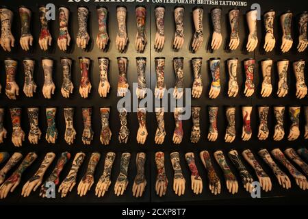 Ayr, Ayrshire, Scotland, UK 19 Jan 2019, An exhibition celebrating the art of tattoo at Rozelle Park.. Photo shows display of tattoos on arms Stock Photo