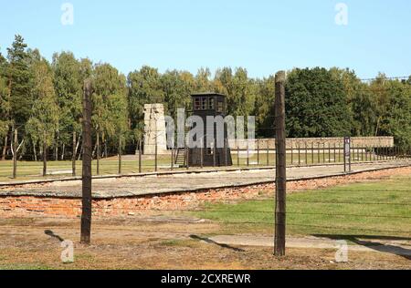 Sztutowo, Poland. 1st Oct, 2020. A view of the former Nazi German Stutthof death camp: barbed wire fence, monument and guard-house. The Stutthof Museum in Sztutowo. Konzentrationslager Stutthof - former German Nazi concentration camp established in the annexed areas of the Free City of Gdansk, 36 km from Gdansk. It functioned during the Second World War, from September 2, 1939 to May 9, 1945. Credit: Damian Klamka/ZUMA Wire/Alamy Live News Stock Photo