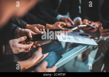 business team analyzing financial data . people and technology Stock Photo