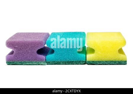 Multicolored sponges for cleaning, isolated on white background. Stock Photo