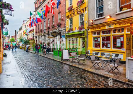 Dublin, Ireland - August 6, 2010: View of pub street in the downtown of Dublin. Stock Photo
