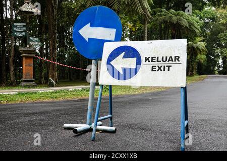 Sign toilet, stair and exit direction, blue text and red arrow on white background sign. It show for information transpot interior building for emerge Stock Photo