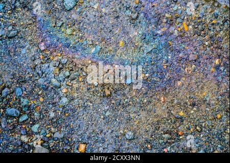 Gasoline flows on the pavement. Stock Photo