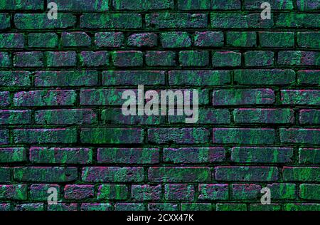 green-violet painted grunge brick wall texture background, splashes and smudges of paint Stock Photo