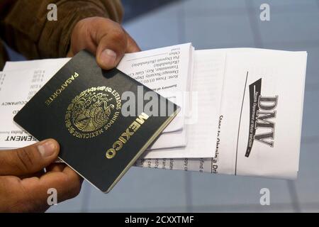 A Mexican national holds his passport and paperwork at a Department of  Motor Vehicles office in Las Vegas, Nevada January 2, 2014. REUTERS/Las  Vegas Sun/Steve Marcus (UNITED STATES - Tags: TRANSPORT Stock Photo - Alamy