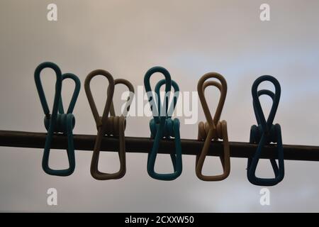 clothes clips hanging on a wire in a house of Kathmandu, Stock Photo