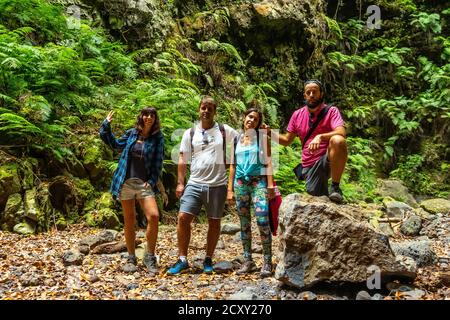 Shot of happy tourists in Los Tinos Natural Park, Canary Islands, Spain Stock Photo