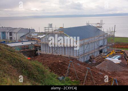 Progress on the construction of Ogmore by sea village hall on the main road through this small seaside village. Stock Photo