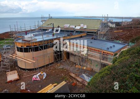 Progress on the construction of Ogmore by sea village hall on the main road through this small seaside village. Stock Photo