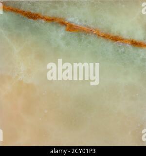 Natural yellow and aqua onyx closeup as a beautiful background Stock Photo