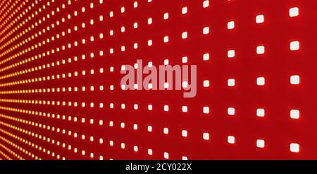 RGB LED screen panel texture. Close-up of a pixel LED screen with bokeh for wallpaper. Bright red abstract background perfect for any design Stock Photo