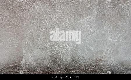 Elegant abstract gray background. Vintage pattern with artistic decorative plaster for design. Gray grunge texture. Background wallpaper. Old cement Stock Photo