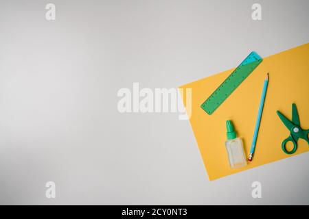 green and yellow craft materials on white background Stock Photo