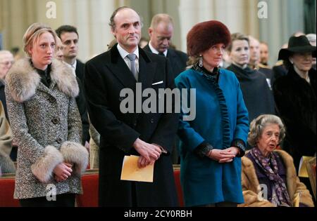 (L-R) Belgium's Princess Maria-Laura, Prince Lorenz, Princess Astrid and Queen Fabiola attend a mass in memory of former members of the royal family at Notre Dame de Laeken church in Brussels February 16, 2012.   REUTERS/Francois Lenoir (BELGIUM - Tags: PROFILE RELIGION ROYALS ENTERTAINMENT)