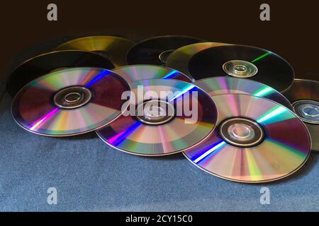 Drive rests upon turn blue the glass table. Disk for keeping of information Stock Photo