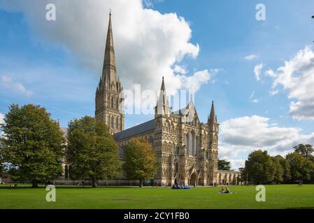 Salisbury Wiltshire, view in summer across the cathedral grounds towards the 13th century Cathedral in the centre of the city of Salisbury, England UK Stock Photo