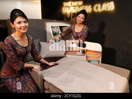 Singapore Airlines business class cabin Stock Photo - Alamy