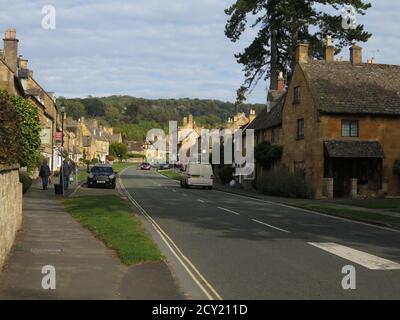 Typical Cotswold stone houses along the road through the English ...