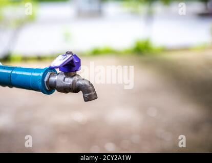 Old water tap blurred background, Save water cocept, Save world and save life concept Stock Photo