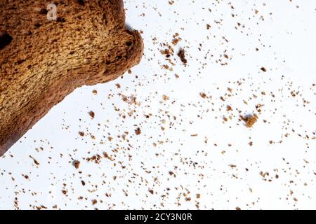 crumbs of cookie macro isolated on white background Stock Photo