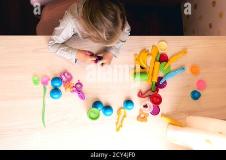 Kids Drawing Of Family And Colored Pencils On Wooden Table Stock Photo,  Picture and Royalty Free Image. Image 27543536.