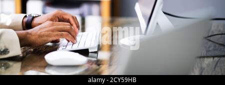 Using Computer Keyboard Close Up. Typing Mail Stock Photo