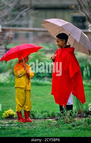 Boy wearing raincoat hi-res stock photography and images - Alamy