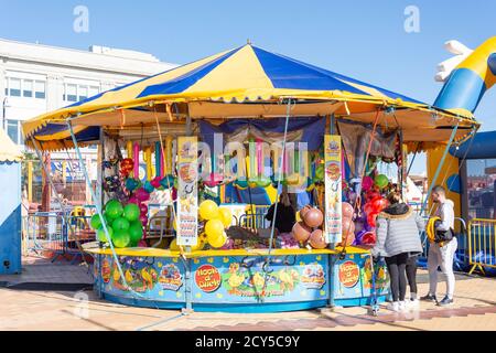 'Hook a duck' prize game stall at promenade funfair, Barry Island, Barry (Y Barri), Vale of Glamorgan, Wales, United Kingdom Stock Photo