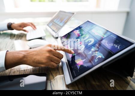 African American Financial Business Advisor Using Computer Stock Photo
