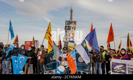 Tibetan, Uyghur, Taiwanese, Hong Konger, South Mongolian, and Chinese activists observed the ‘Global Day of Action’ at Place de la Bastille in Paris to boycott the upcoming controversial Beijing winter Olympics scheduled for February 2022, Paris, June 23, 2021 Stock Photo