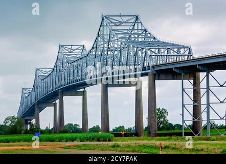 The Sunshine Bridge crosses the Mississippi River, Aug. 25, 2020, in Convent, Louisiana. The cantilever bridge connects Ascension Parish and St. James. Stock Photo