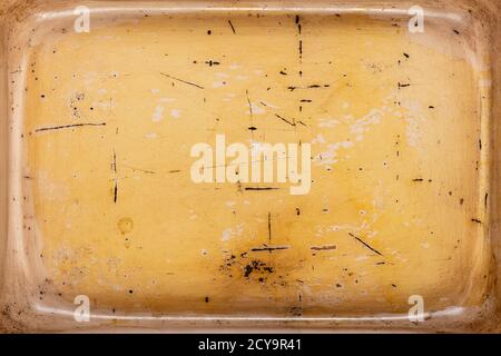Abstract texture of used metal baking or roasting tray for background use. Stock Photo