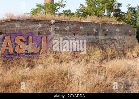 Graffiti on the wall of ruins Stock Photo