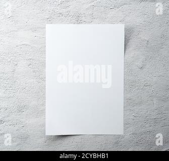 White paper on a concrete background. Stock Photo