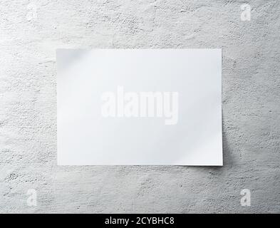 White paper on a concrete background. Stock Photo