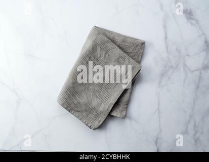 Kitchen napkins on a stone background Stock Photo