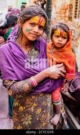 Nandgeon, India, Holi Festival, Feb 25, 2018 - Mother and daughter show off their forehead painted symbols Stock Photo