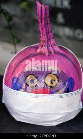 St. Louis, United States. 01st Oct, 2020. Decorated pumpkins, some with masks, sit on sale for Halloween at the Bayer's Garden Shop in St. Louis on Thursday, October 1, 2020. Photo by Bill Greenblatt/UPI Credit: UPI/Alamy Live News Stock Photo