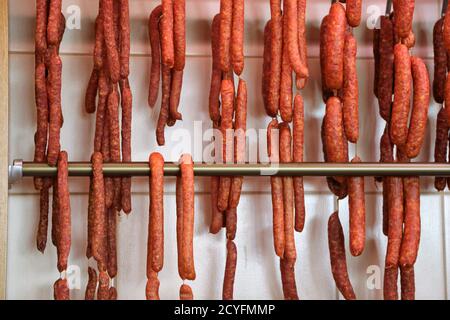 Air dried sausage in a butchery Stock Photo