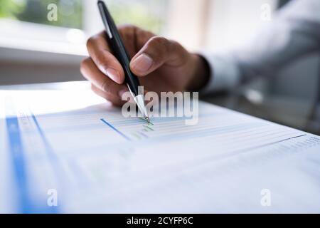 Gantt Chart Project Schedule And Employee Staff Report Stock Photo