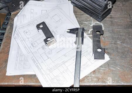 Workplace of engineer in office bearing prees Stock Photo