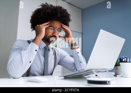 African Business Man Upset And Worry Or Bored Or Stressed Stock Photo