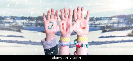Children Hands Building Word Jul Means Christmas, Snowy Winter Background Stock Photo